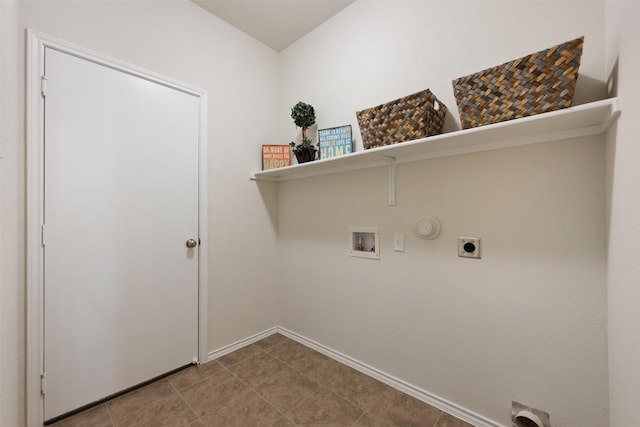 laundry area with baseboards, gas dryer hookup, washer hookup, laundry area, and hookup for an electric dryer