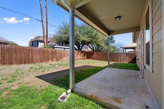 view of yard featuring a fenced backyard and a patio area