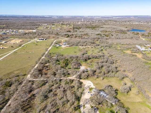 birds eye view of property featuring a rural view