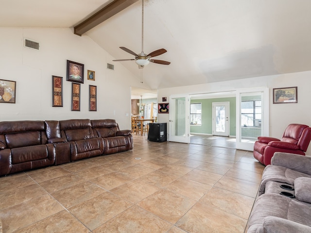 living room featuring ceiling fan, beamed ceiling, and high vaulted ceiling