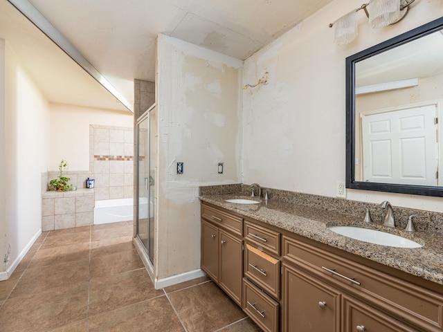 bathroom featuring vanity and separate shower and tub