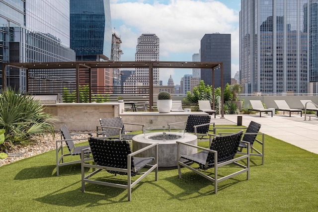 view of patio / terrace featuring a fire pit