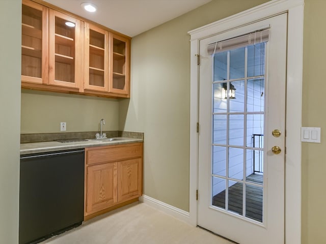 kitchen with black dishwasher and sink