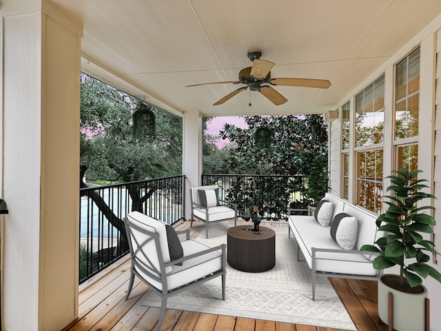 wooden deck with ceiling fan