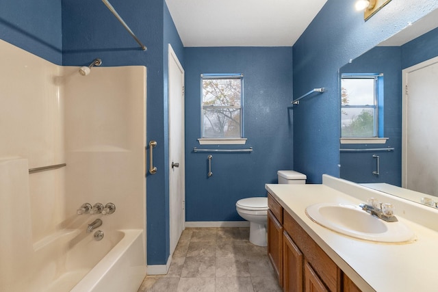 full bathroom featuring shower / tub combination, vanity, toilet, and a healthy amount of sunlight