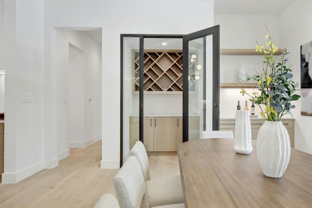 dining room featuring light hardwood / wood-style flooring