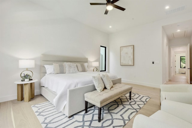 bedroom featuring ceiling fan and light hardwood / wood-style floors