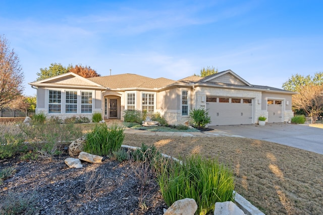 ranch-style home featuring a garage