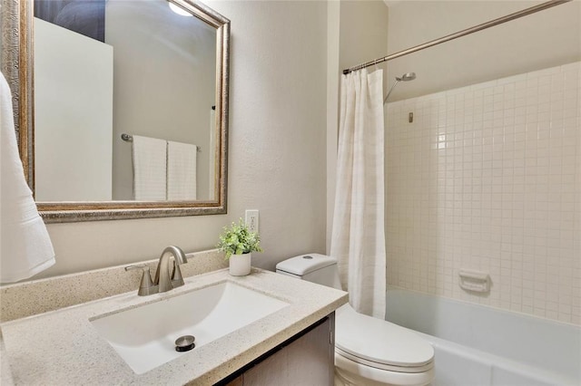 full bathroom featuring shower / bath combination with curtain, vanity, and toilet