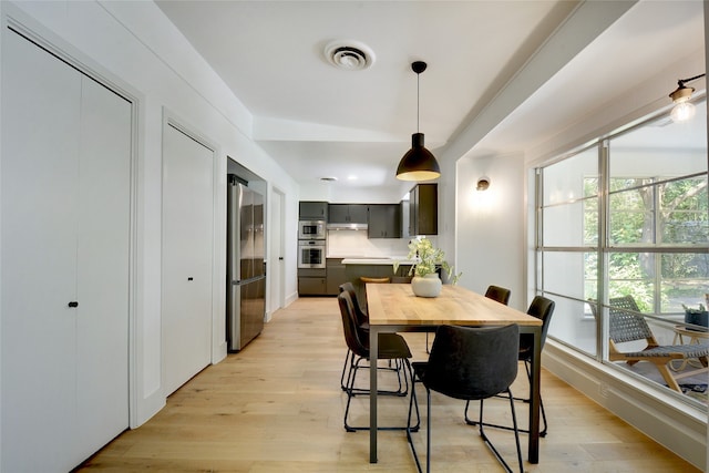 dining room featuring light wood-type flooring