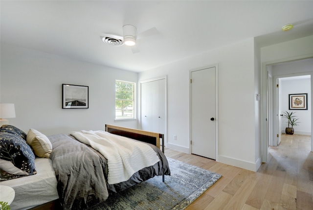 bedroom featuring ceiling fan and light wood-type flooring