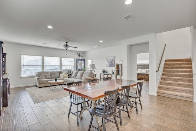 dining space with ceiling fan