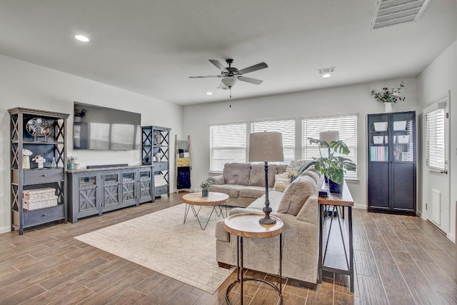 living room featuring ceiling fan