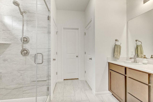 bathroom featuring vanity and walk in shower