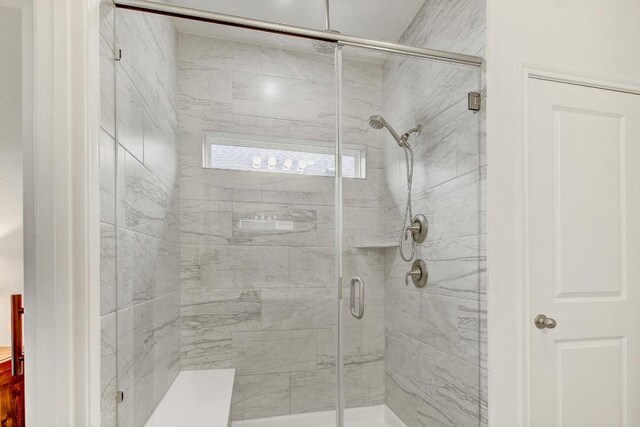 bathroom with walk in shower