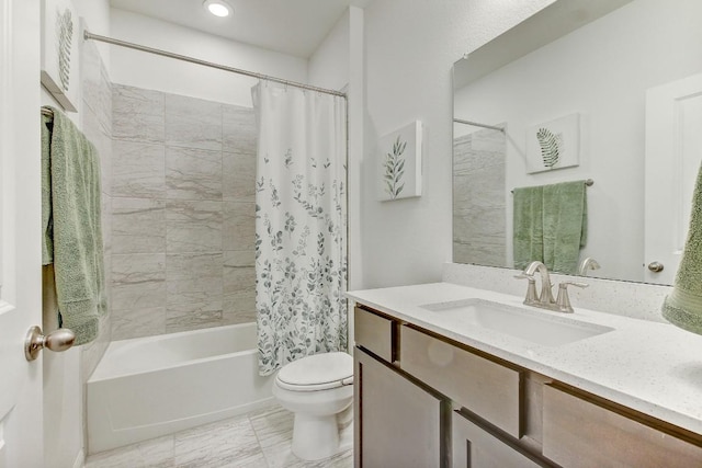 full bathroom featuring shower / bath combination with curtain, vanity, and toilet