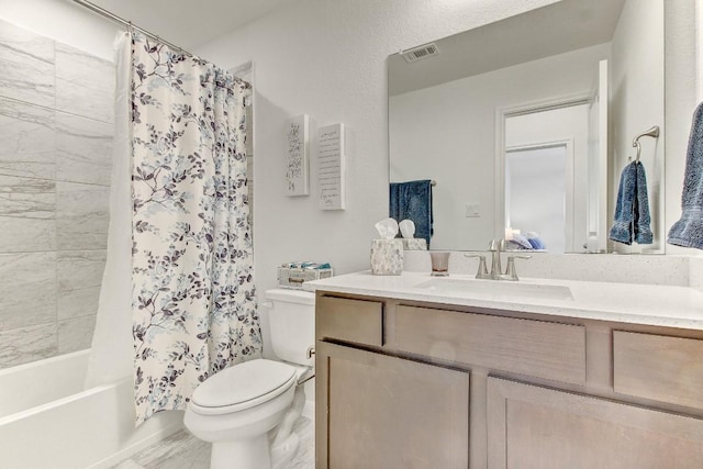 full bathroom with vanity, toilet, and shower / bath combo