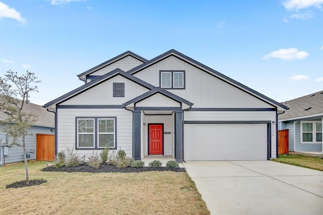 view of front facade featuring a garage and a front yard