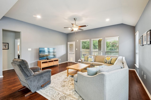 living room with vaulted ceiling, ceiling fan, and dark hardwood / wood-style floors