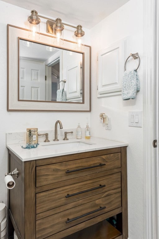 509 Short Circuit Unit 203, Horseshoe Bay, TX 78657 - bathroom featuring vanity and toilet