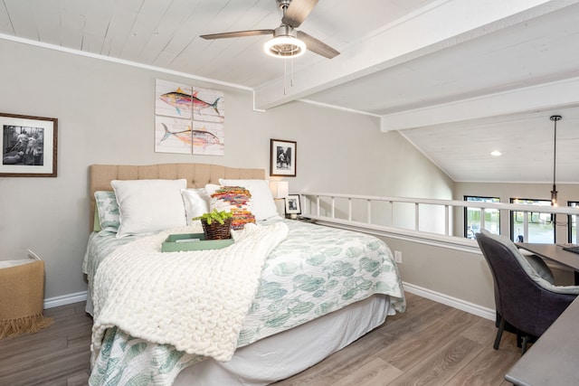 bedroom with lofted ceiling with beams, hardwood / wood-style flooring, ceiling fan, and wood ceiling