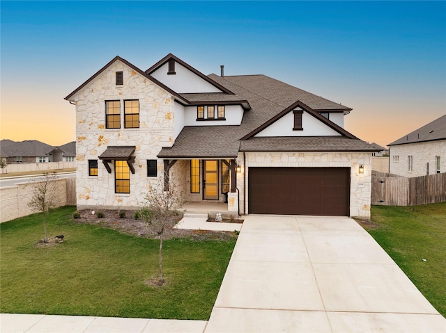 view of front of house with a yard