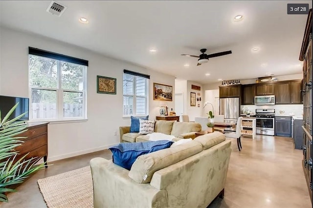 living room with ceiling fan