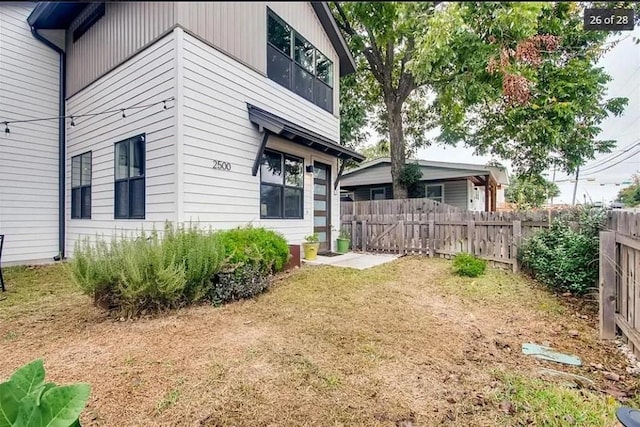 view of home's exterior featuring a yard