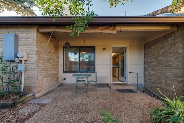 doorway to property featuring a patio area