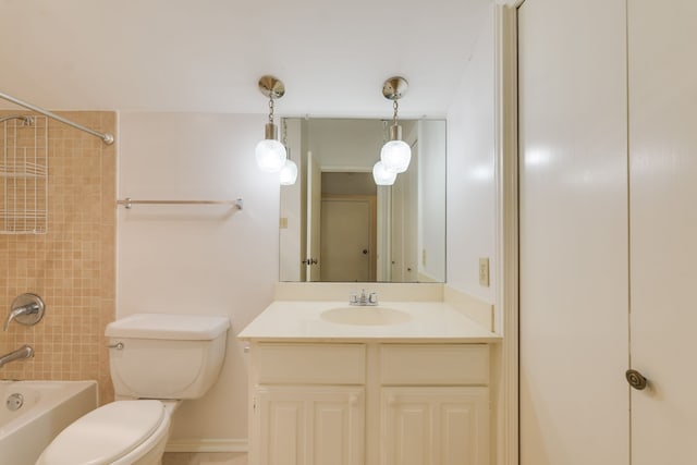 full bathroom with vanity, toilet, and tiled shower / bath combo