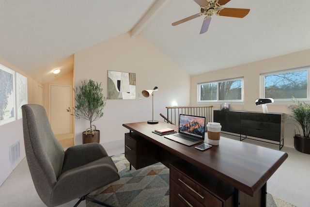 office featuring lofted ceiling with beams, ceiling fan, and light carpet