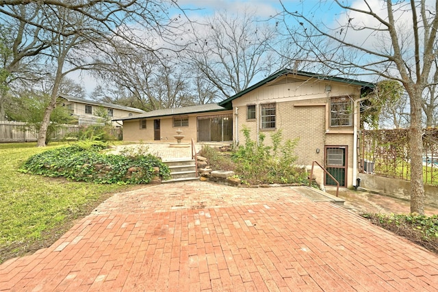 view of front facade featuring a patio area