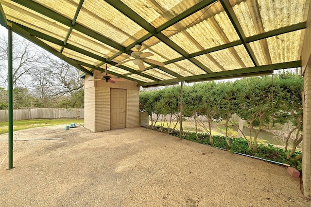 4204 Gregg Ward Ln, Austin, TX 78744 - view of patio / terrace with ceiling fan and an outdoor structure