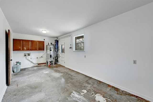 4204 Gregg Ward Ln, Austin, TX 78744 - garage featuring water heater and baseboards
