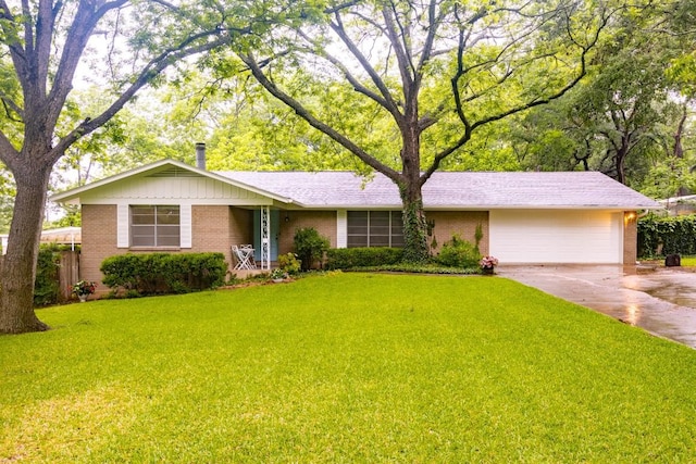 4204 Gregg Ward Ln, Austin, TX 78744 - ranch-style house featuring brick siding, driveway, and an attached garage