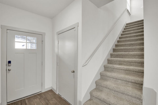 foyer with dark wood-type flooring