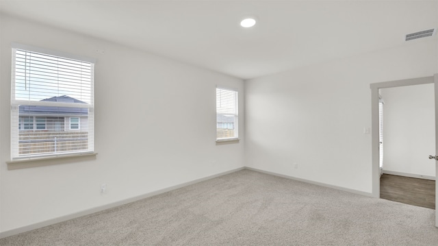 empty room with carpet flooring