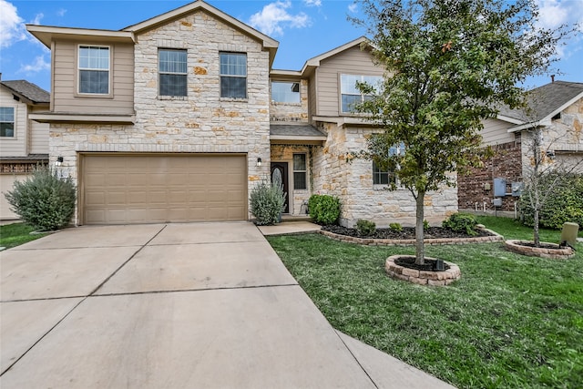 view of front of home featuring a garage and a front yard