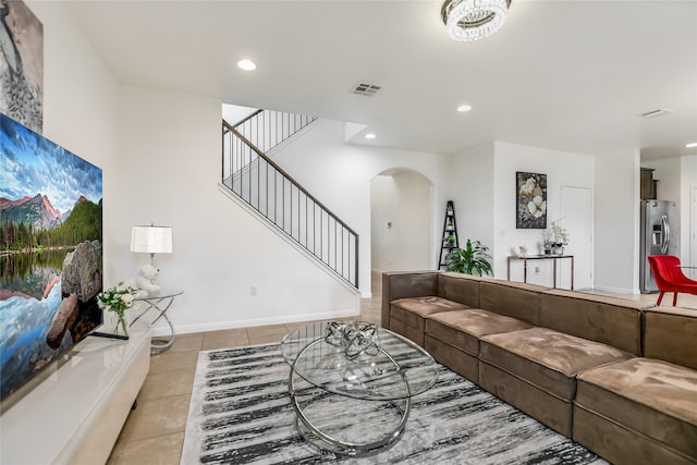 living room with light tile patterned floors