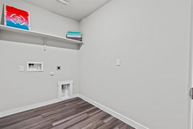 washroom with gas dryer hookup, hardwood / wood-style floors, washer hookup, and hookup for an electric dryer