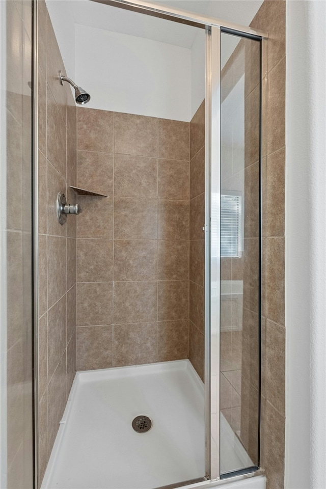 bathroom with an enclosed shower