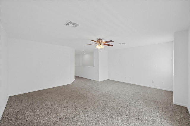 unfurnished room with carpet and ceiling fan