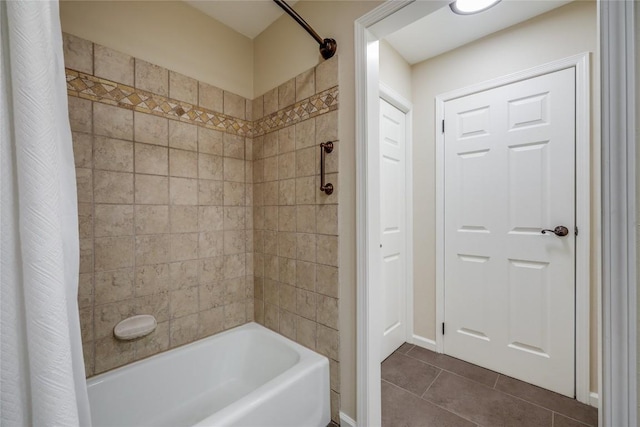 8 Oaks Pl, Lago Vista, TX 78645 - bathroom with shower / tub combo with curtain and tile patterned floors