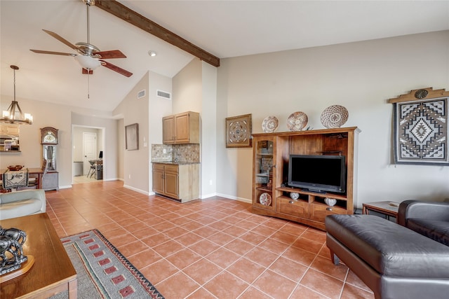 living room with beam ceiling, light tile patterned floors, ceiling fan with notable chandelier, and high vaulted ceiling