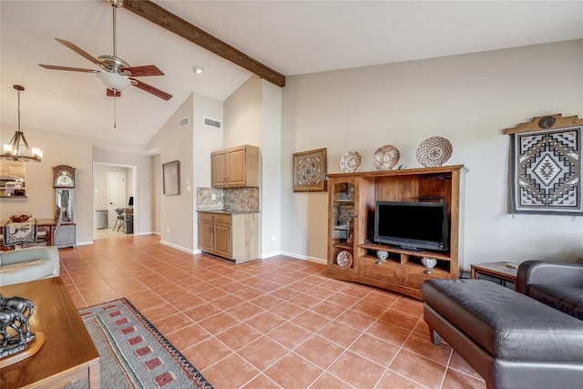 living area featuring light tile patterned floors, high vaulted ceiling, ceiling fan with notable chandelier, and beam ceiling