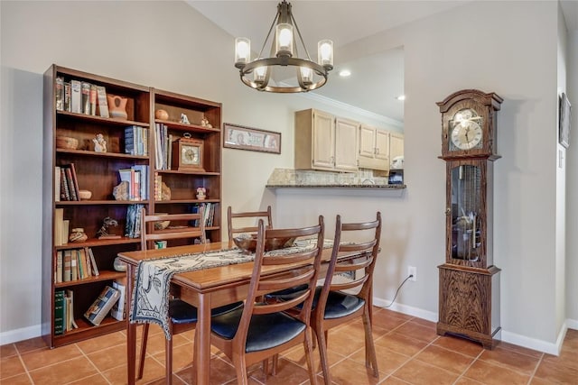 dining room with lofted ceiling, an inviting chandelier, baseboards, and light tile patterned flooring