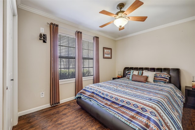 bedroom featuring ceiling fan, dark hardwood / wood-style flooring, crown molding, and a closet