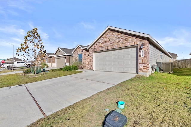 view of front facade featuring central AC, a front yard, and a garage