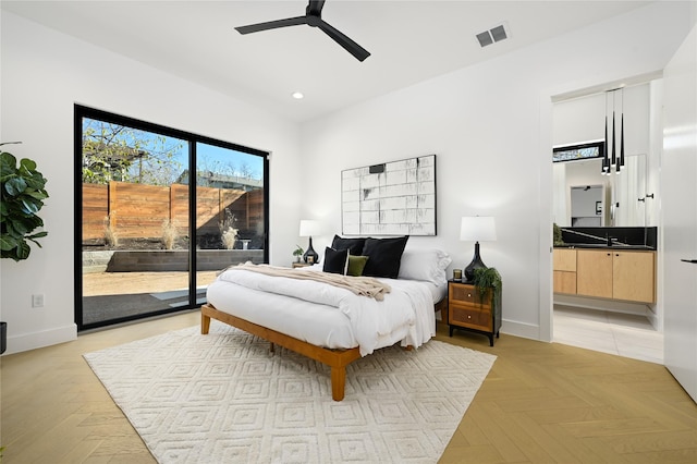 bedroom with access to exterior, ceiling fan, and light parquet flooring