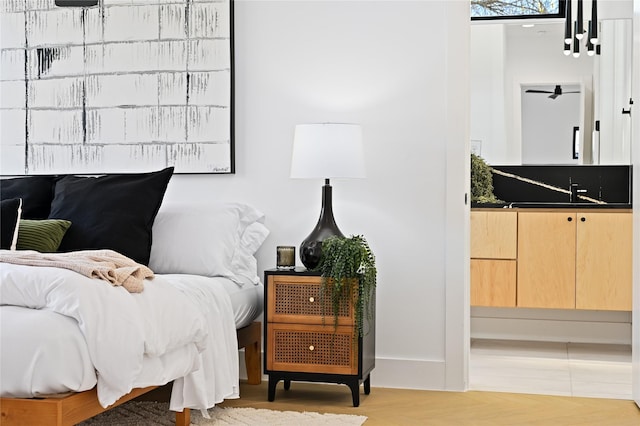 bedroom with light hardwood / wood-style flooring